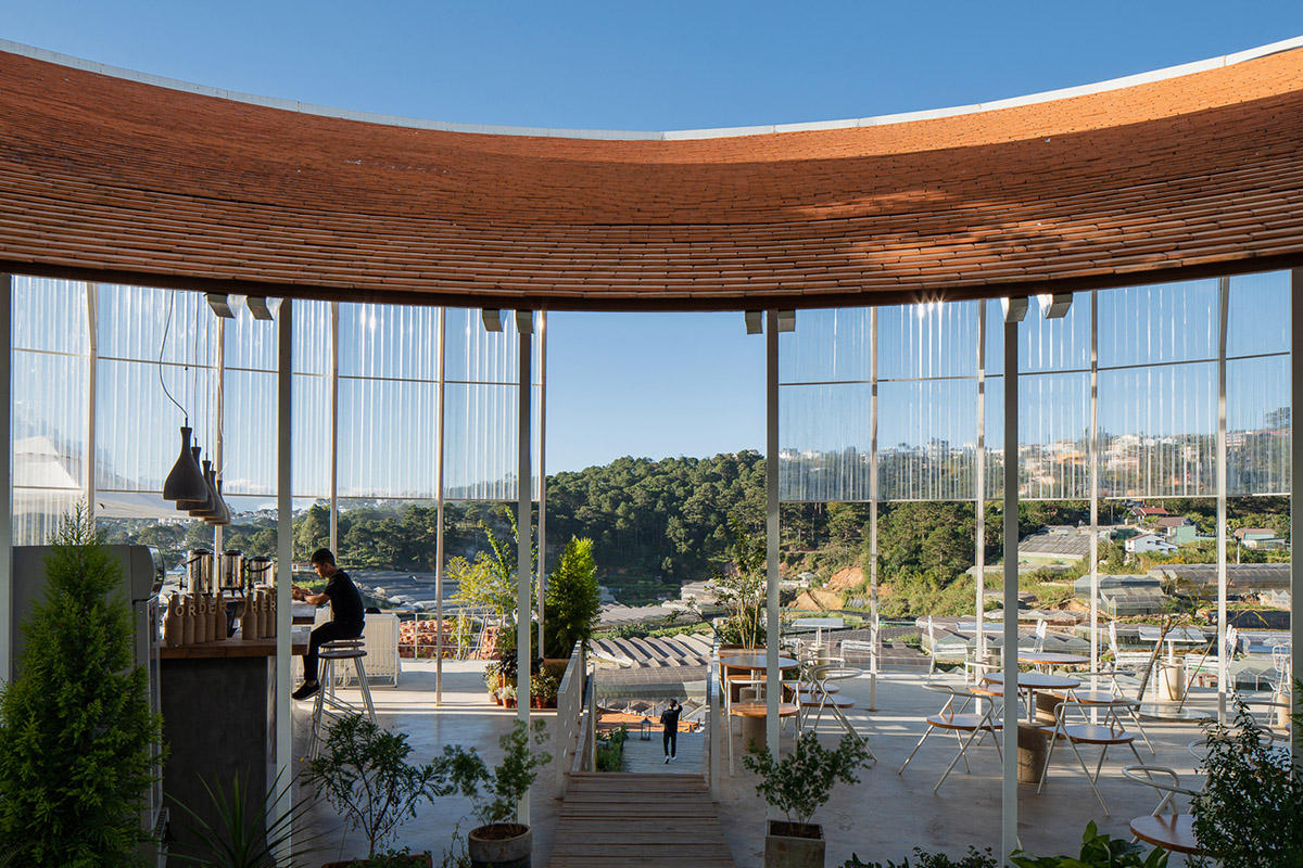 G+ Architects completes all-white circular L00P Boutique Hotel and Café in Vietnam