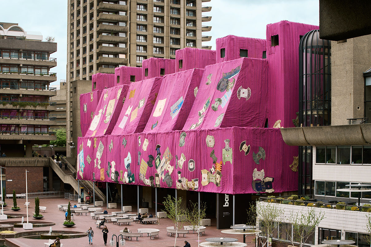 Ghanaian artist Ibrahim Mahama wraps Barbican Centre with handmade pink fabric