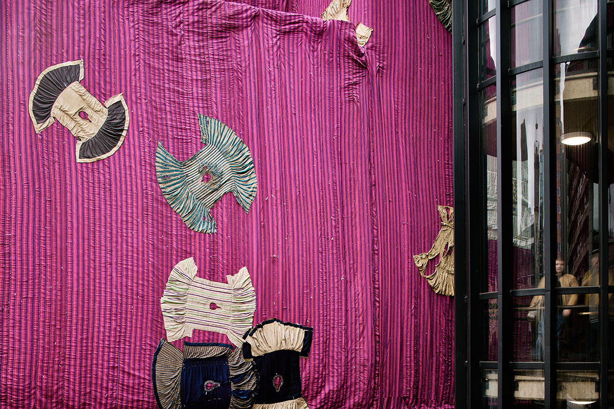 Ghanaian artist Ibrahim Mahama wraps Barbican Centre with handmade pink fabric
