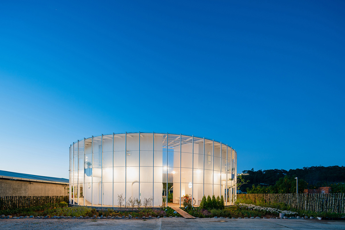 G+ Architects completes all-white circular L00P Boutique Hotel and Café in Vietnam