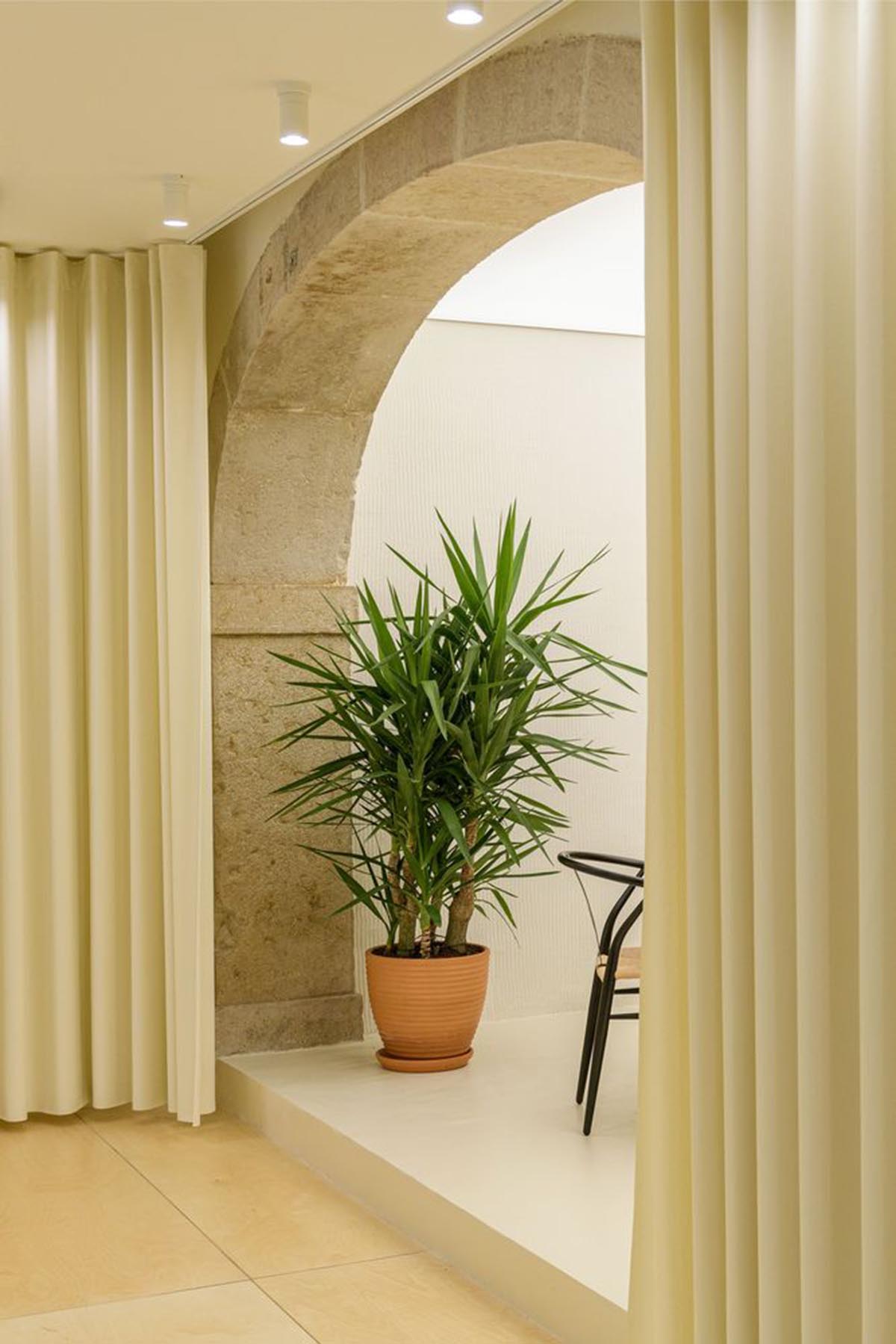 AB+AC Architects' cultural hub can be used for various kinds of activities with warm tones in Lisbon