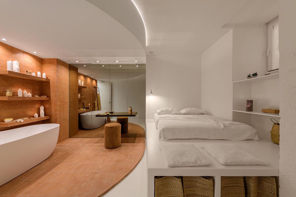 AB+AC Architects' cultural hub can be used for various kinds of activities with warm tones in Lisbon