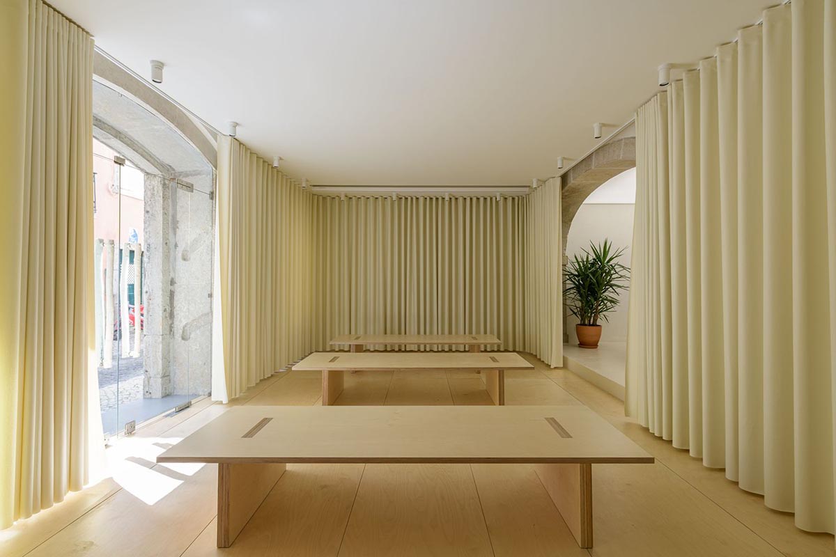 AB+AC Architects' cultural hub can be used for various kinds of activities with warm tones in Lisbon