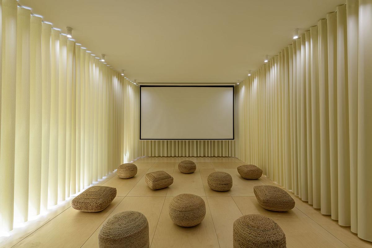 AB+AC Architects' cultural hub can be used for various kinds of activities with warm tones in Lisbon