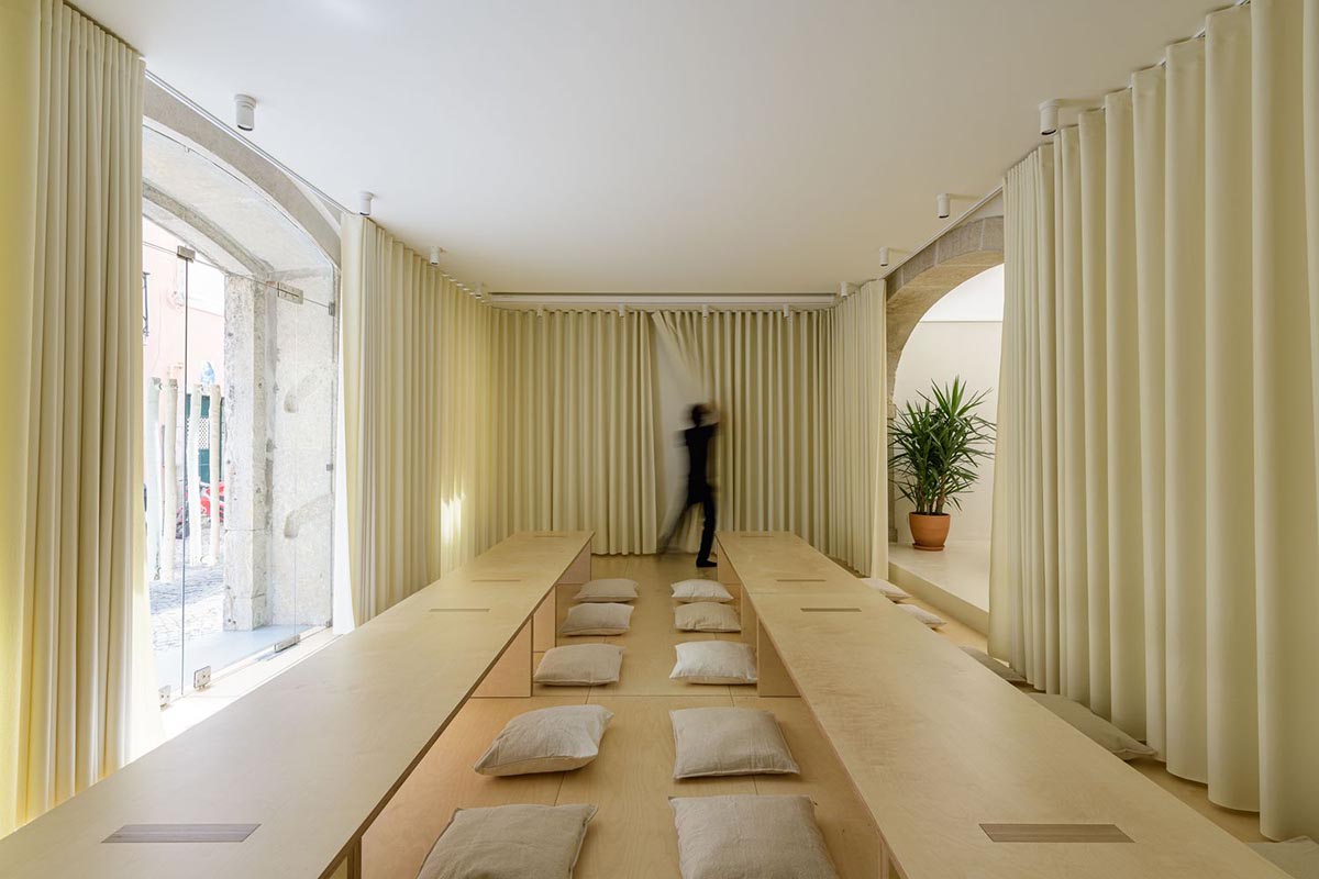 AB+AC Architects' cultural hub can be used for various kinds of activities with warm tones in Lisbon