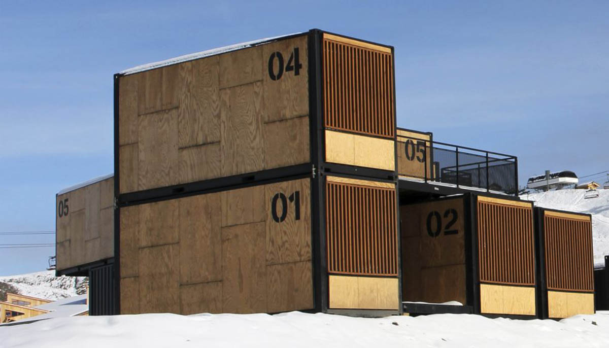 Real wooden shipping containers provide nomadic accommodation designed by Ora Ito