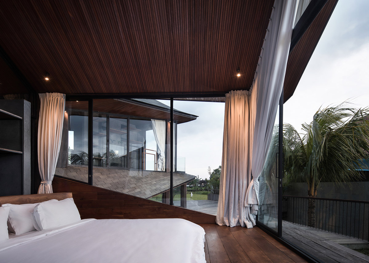 Alexis Dornier's cross-shaped house elevated on stilts to include continuous living space underneath