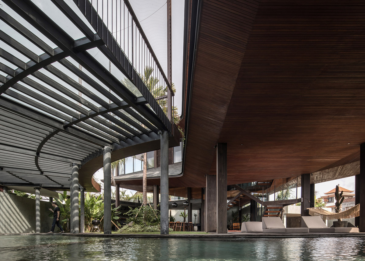 Alexis Dornier's cross-shaped house elevated on stilts to include continuous living space underneath