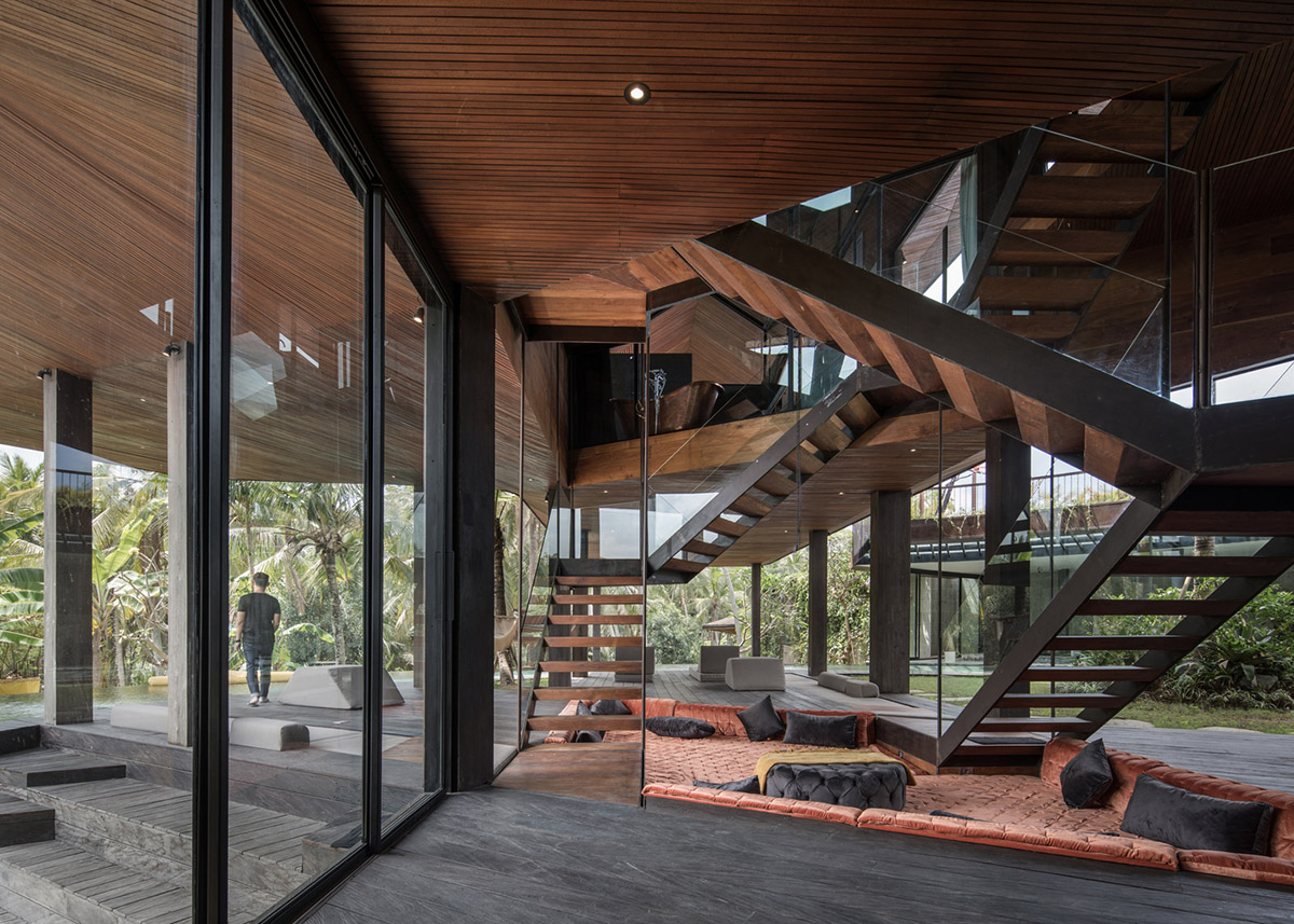 Alexis Dornier's cross-shaped house elevated on stilts to include continuous living space underneath