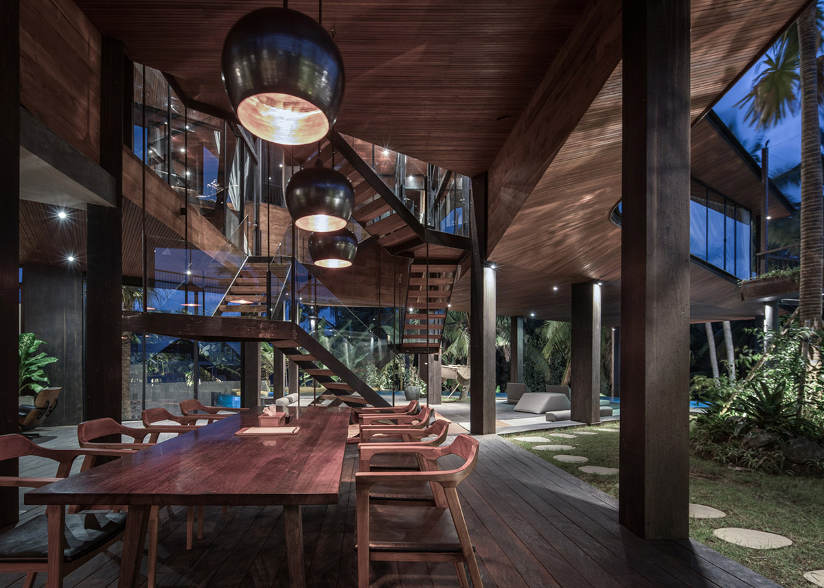 Alexis Dornier's cross-shaped house elevated on stilts to include continuous living space underneath