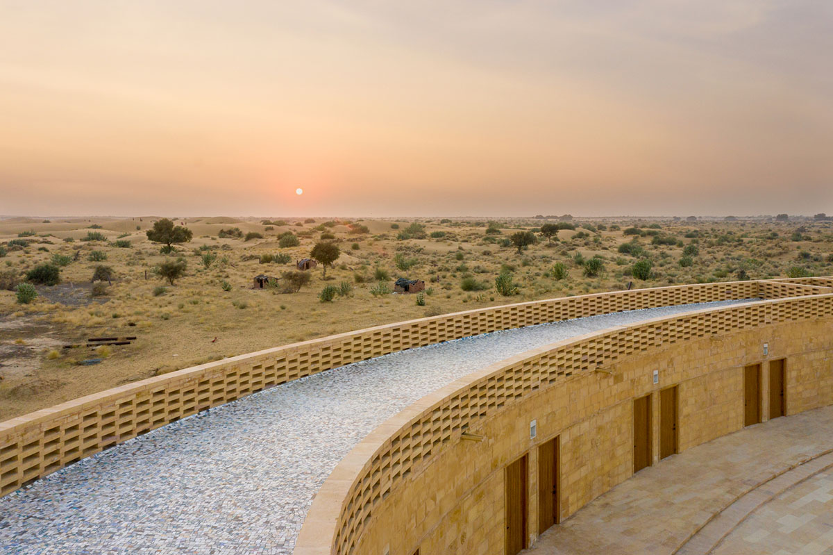 Diana Kellogg Architects' oval-shaped girl's school is made of hand-carved sandstone in rural India