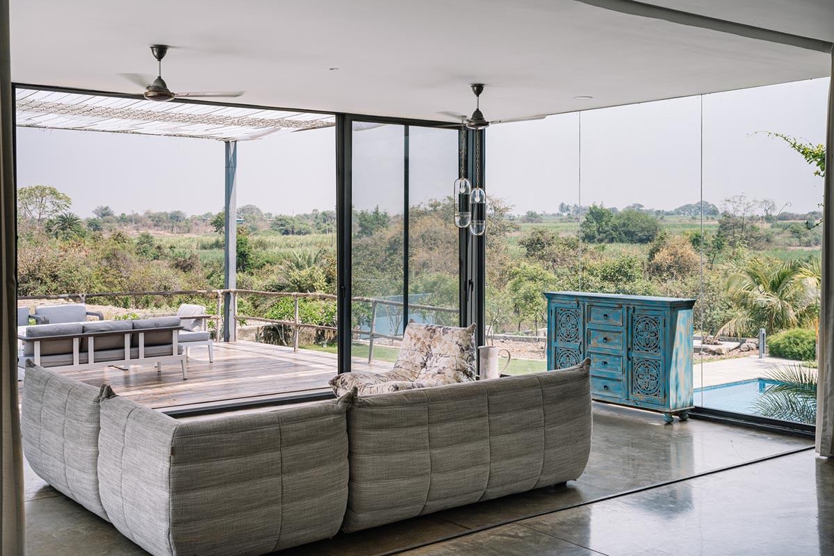 Weekend home is clad in bamboo screens that create a rustic appearance on the outskirts of Pune