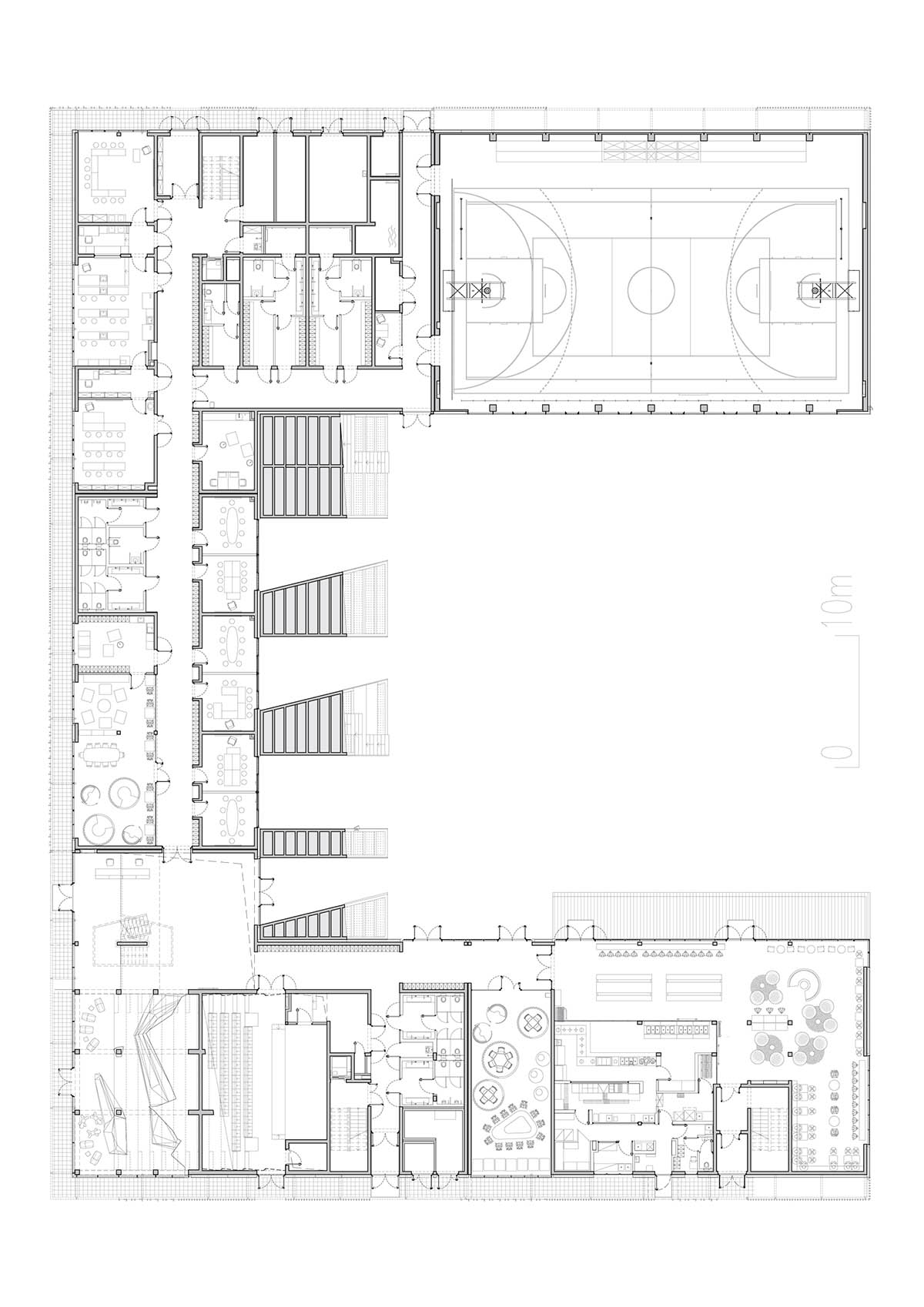 Huge tribunes invite students to sit and experience the courtyard in Warsaw's Akademeia High School