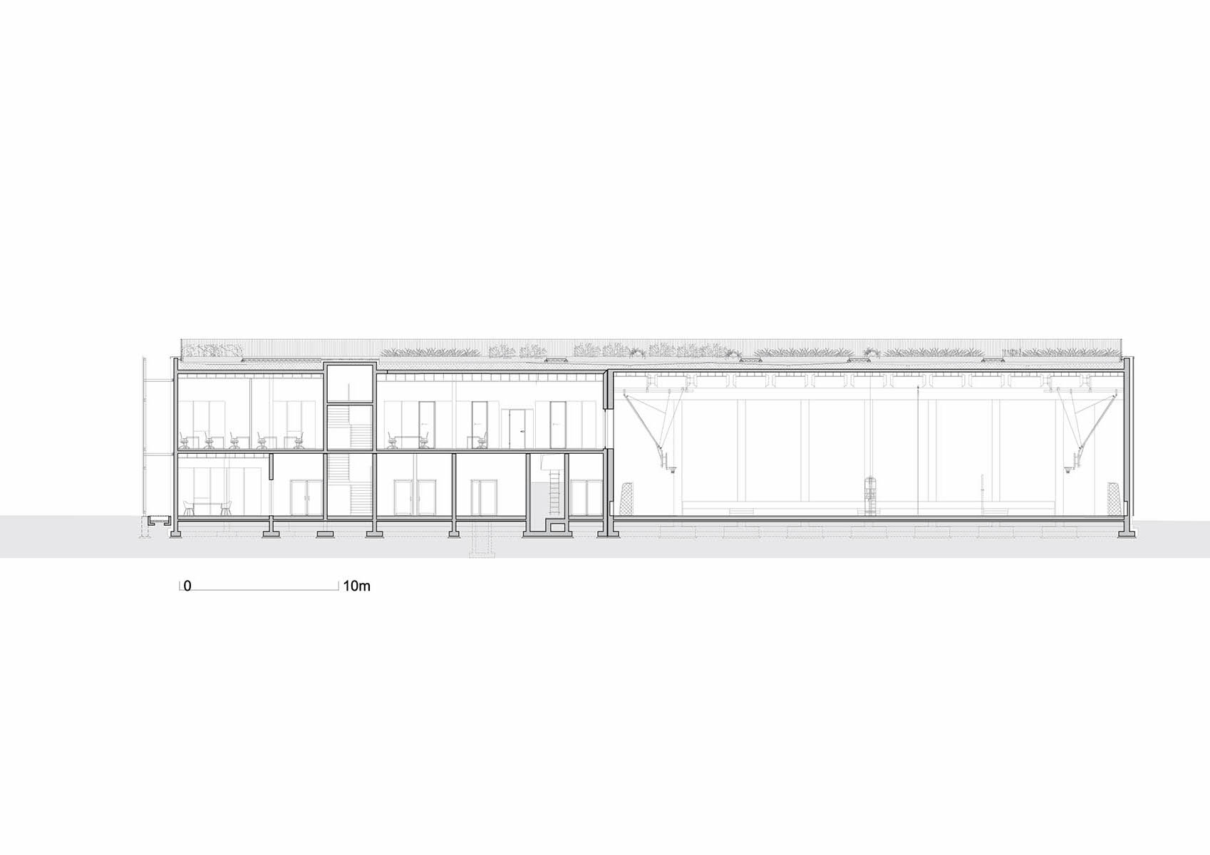 Huge tribunes invite students to sit and experience the courtyard in Warsaw's Akademeia High School
