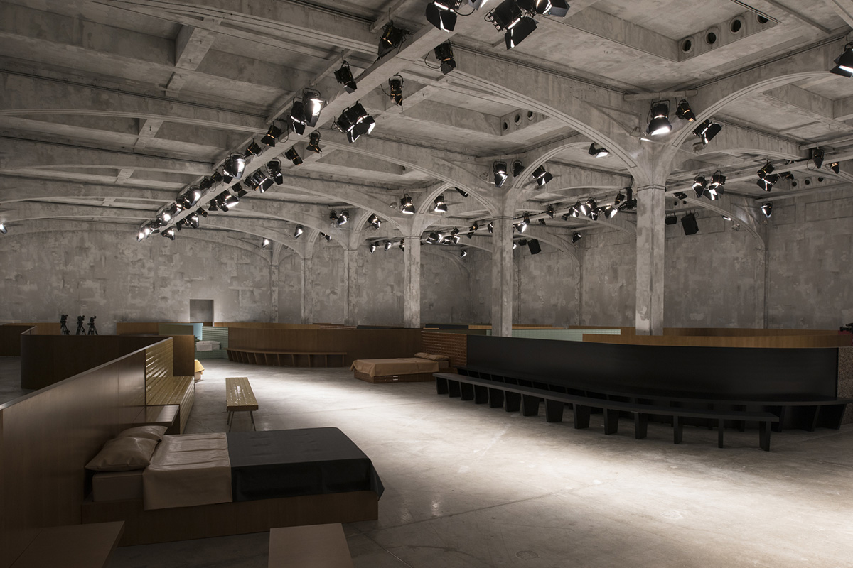 AMO revives basics with frozen domestic fashion sets for Prada’s A/W show in Milan