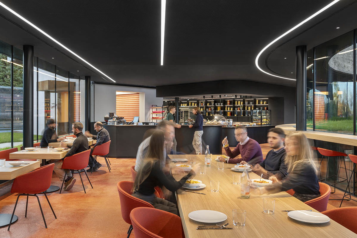 Carlo Ratti Associati reveals earthy, sunken business canteen in Italy’s food valley
