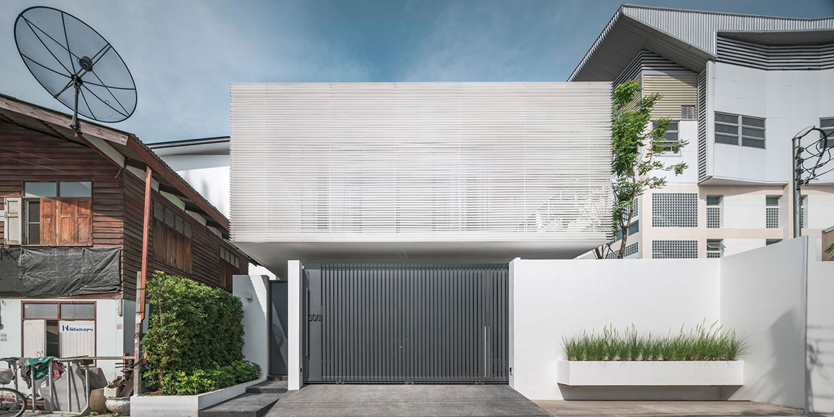 Anonym Studio completes Y House with white louvres in the old ...