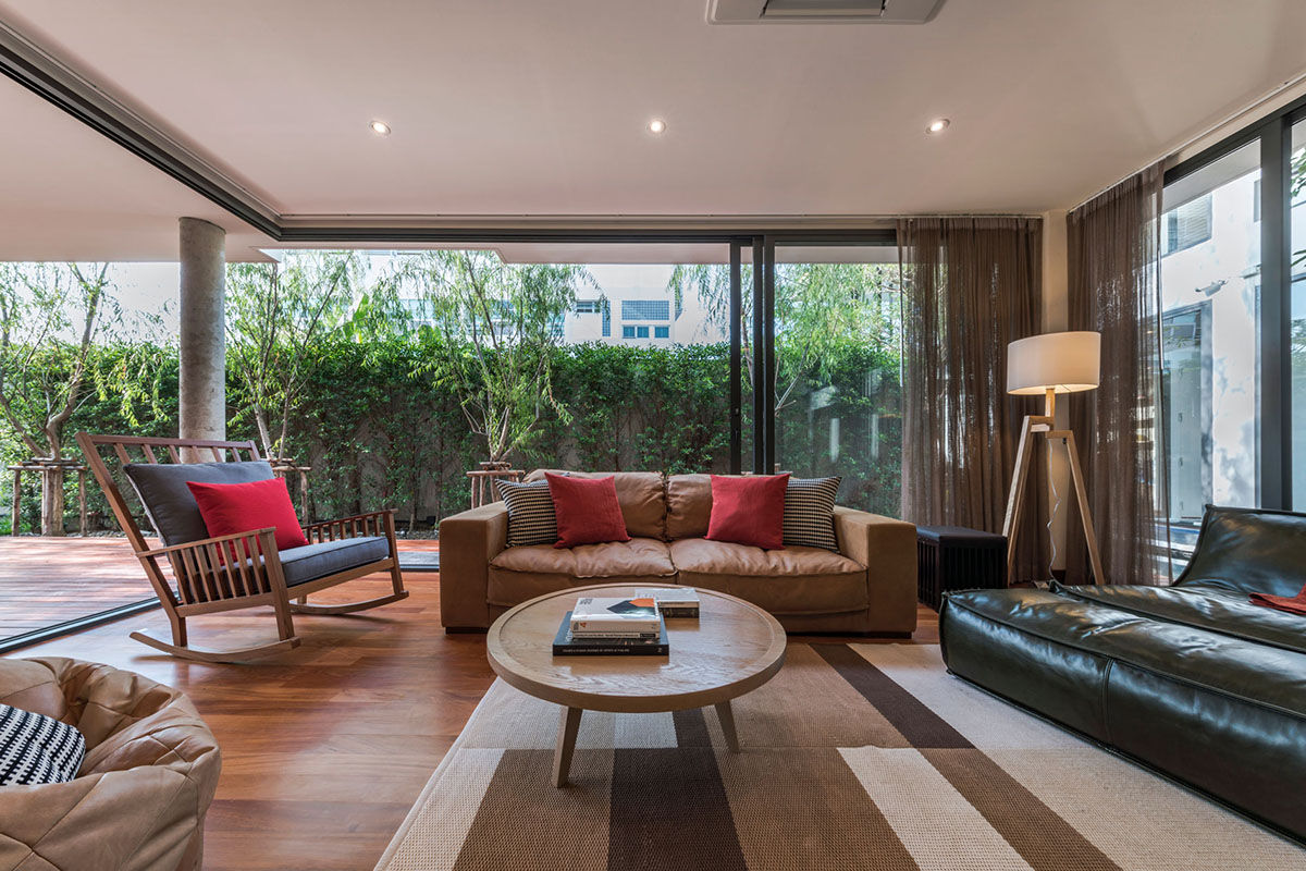 Anonym Studio completes Y House with white louvres in the old neighborhood of Thailand