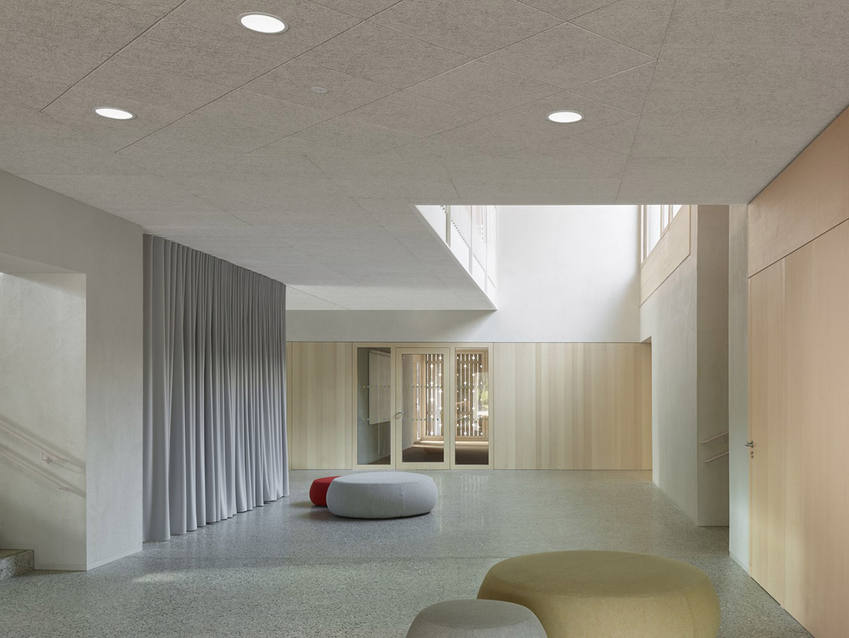 Innauer-Matt Architekten designs kindergarten with large pointed windows and wall motifs in Austria