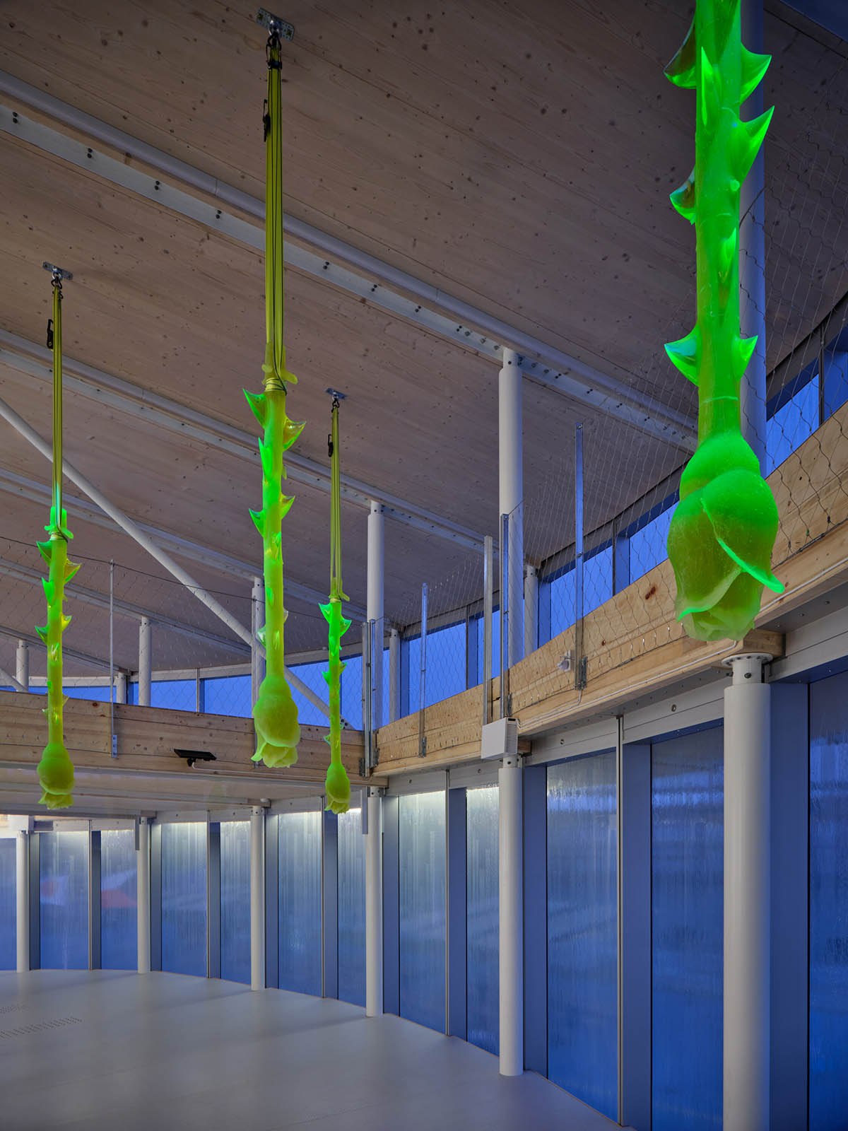 Rotating glass and wooden volumes reflect energy and continuous development at the Czech Pavilion 