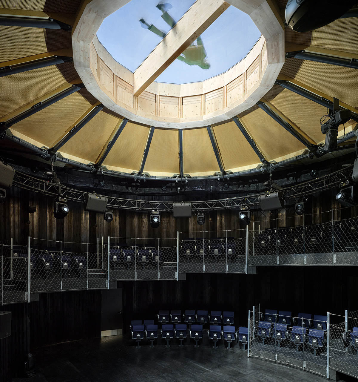 Rotating glass and wooden volumes reflect energy and continuous development at the Czech Pavilion 