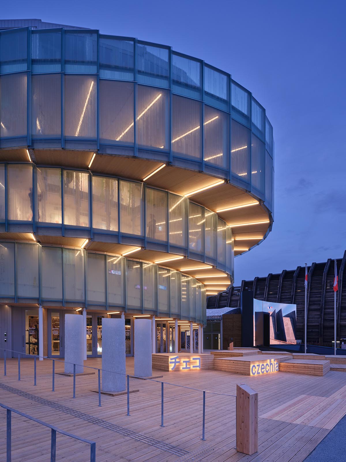Rotating glass and wooden volumes reflect energy and continuous development at the Czech Pavilion 