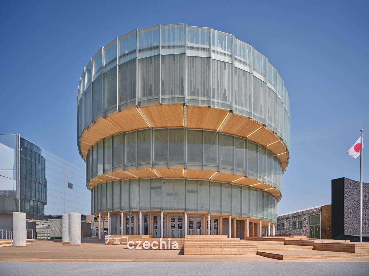 Rotating glass and wooden volumes reflect energy and continuous development at the Czech Pavilion 