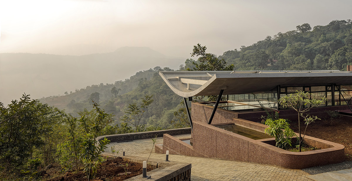 The Cove House by Red Brick Studio benefits from hilly slope and captures picturesque views in India