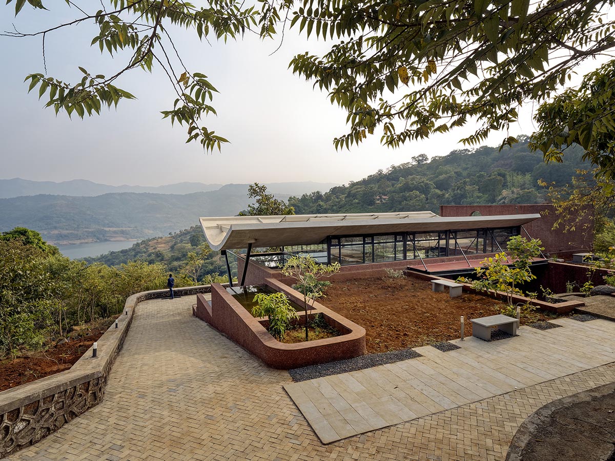 The Cove House by Red Brick Studio benefits from hilly slope and captures picturesque views in India