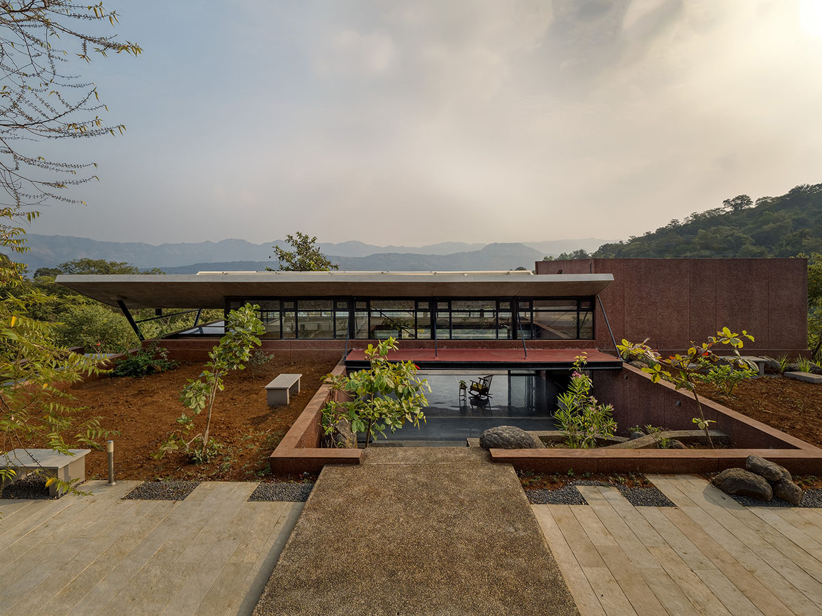 The Cove House by Red Brick Studio benefits from hilly slope and captures picturesque views in India