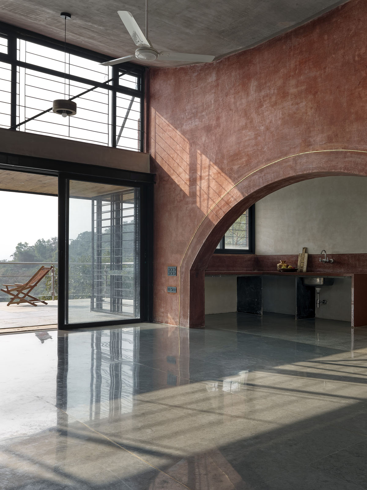 The Cove House by Red Brick Studio benefits from hilly slope and captures picturesque views in India