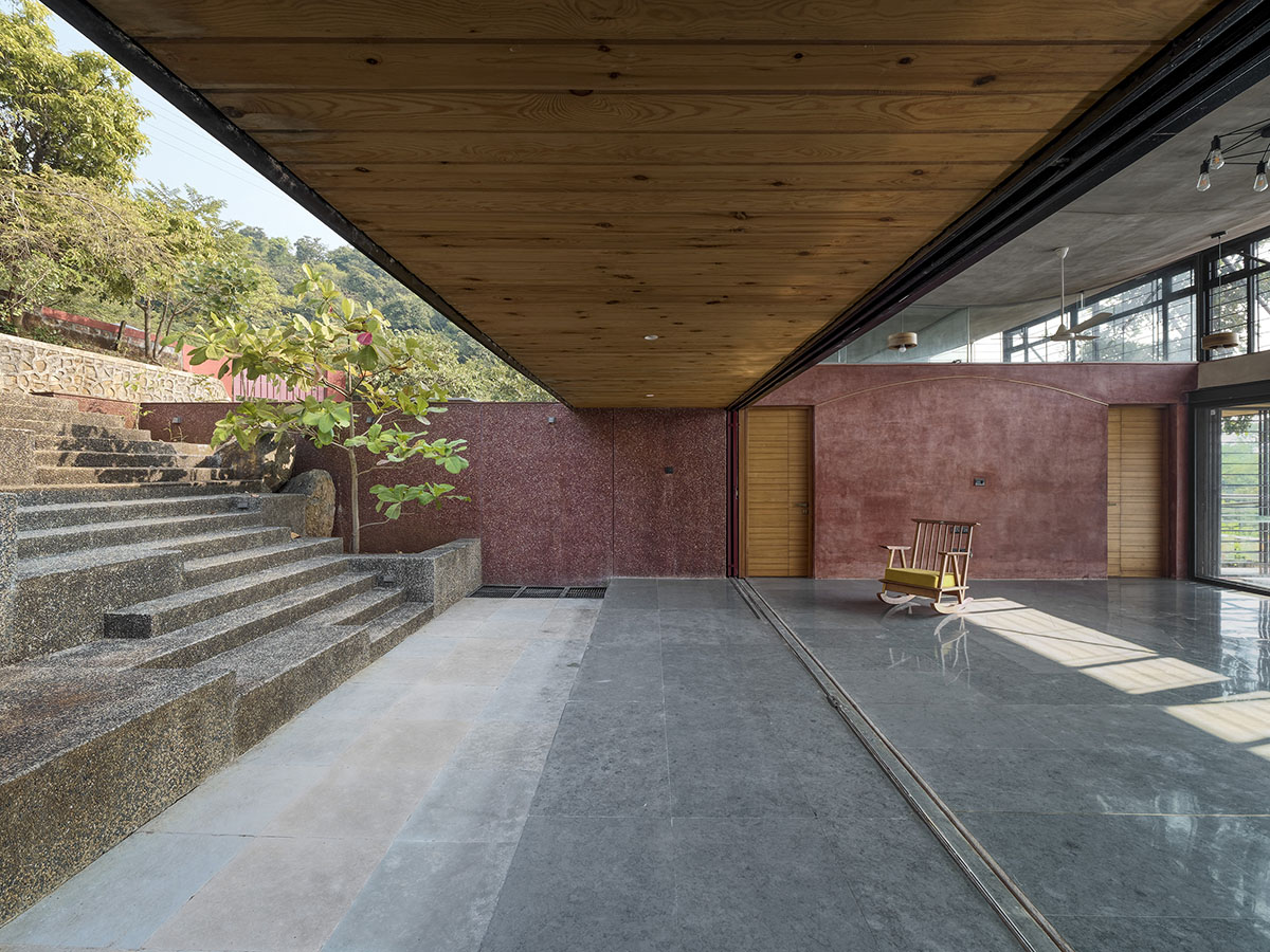 The Cove House by Red Brick Studio benefits from hilly slope and captures picturesque views in India