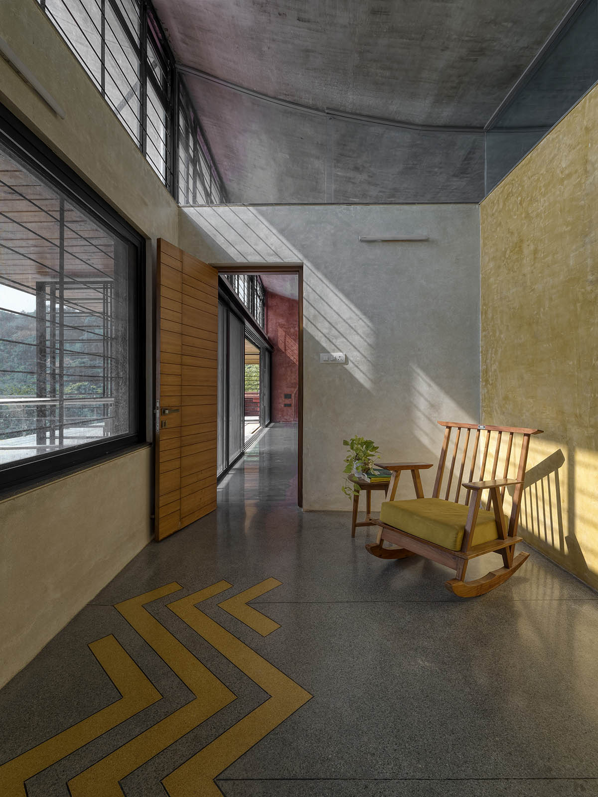 The Cove House by Red Brick Studio benefits from hilly slope and captures picturesque views in India