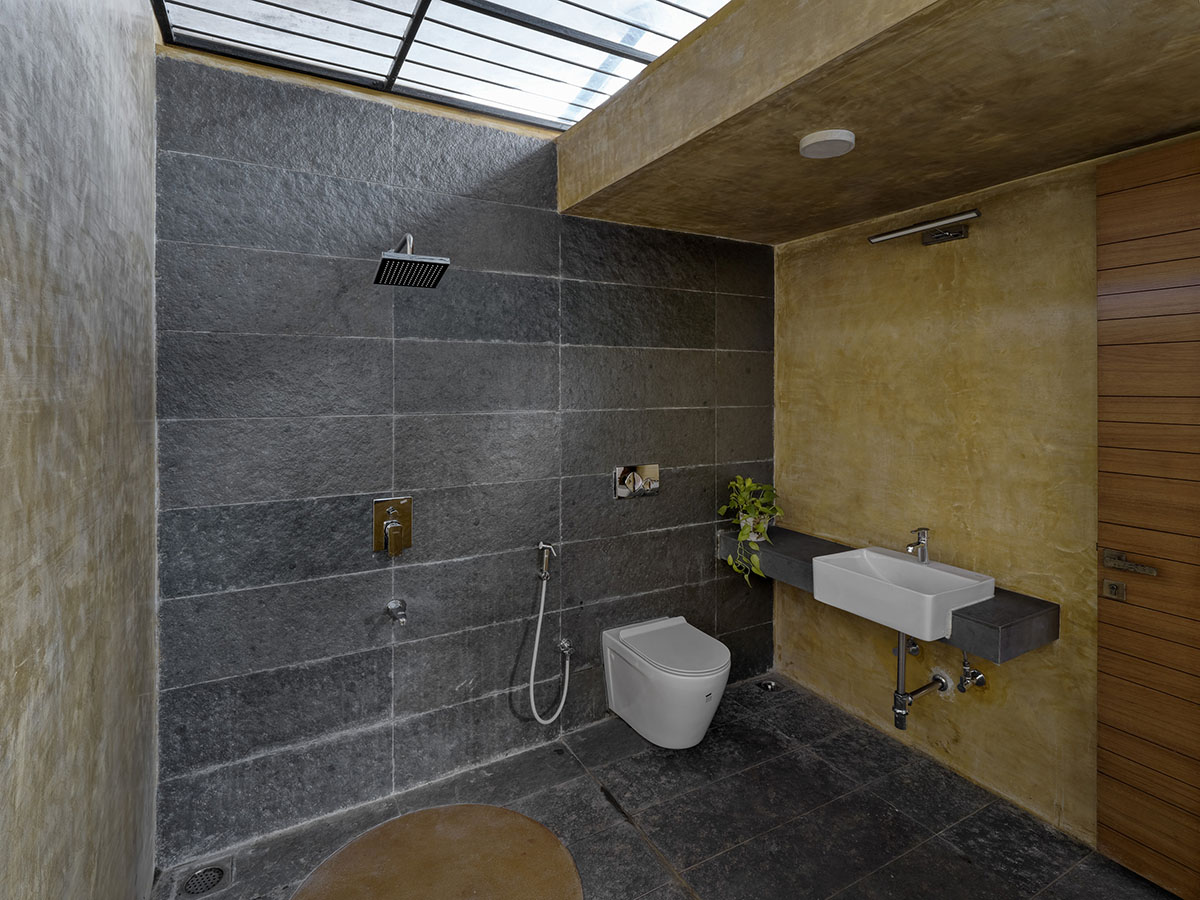 The Cove House by Red Brick Studio benefits from hilly slope and captures picturesque views in India