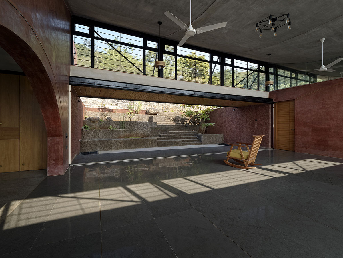 The Cove House by Red Brick Studio benefits from hilly slope and captures picturesque views in India