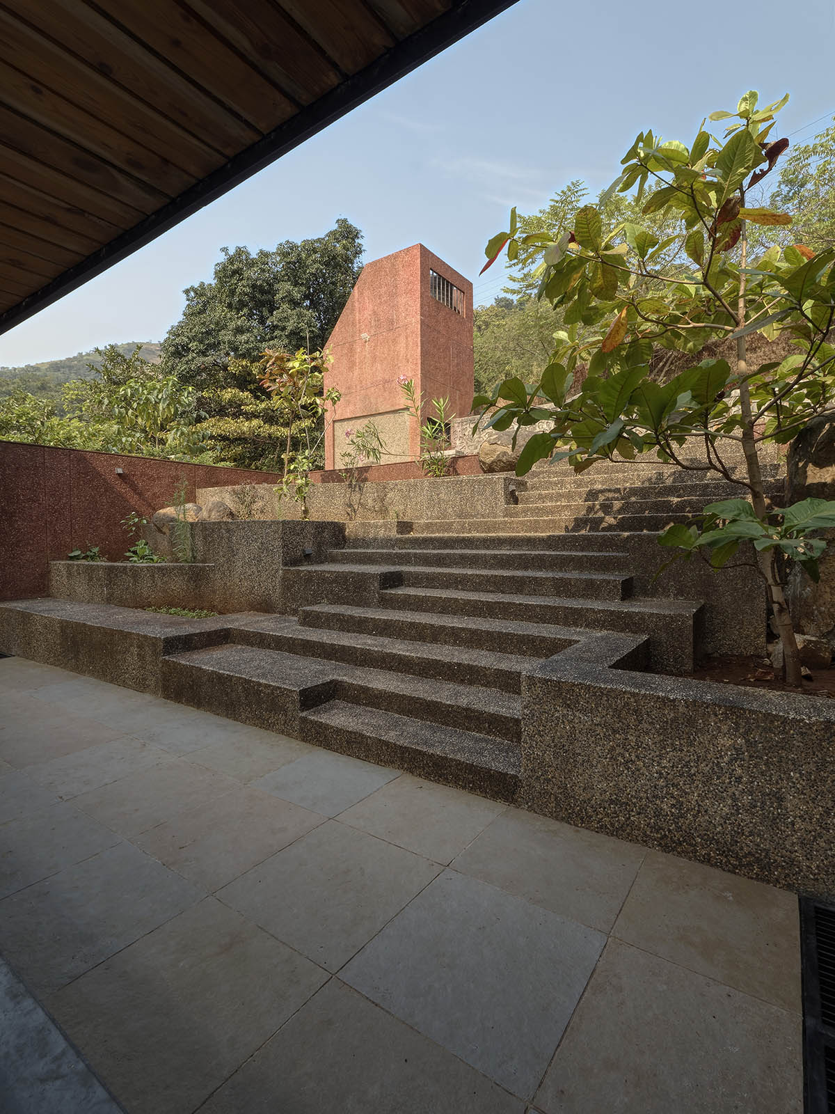 The Cove House by Red Brick Studio benefits from hilly slope and captures picturesque views in India