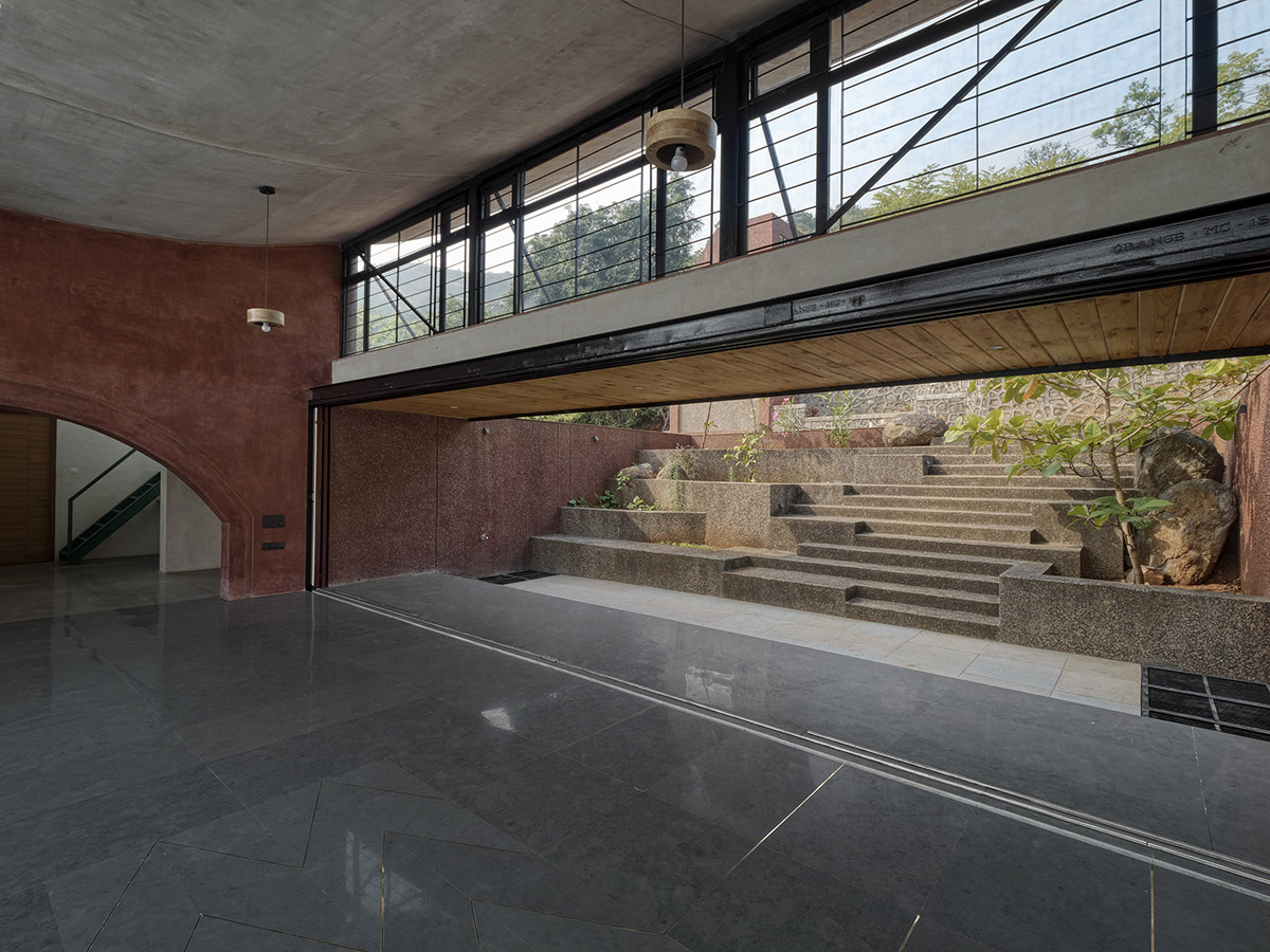The Cove House by Red Brick Studio benefits from hilly slope and captures picturesque views in India