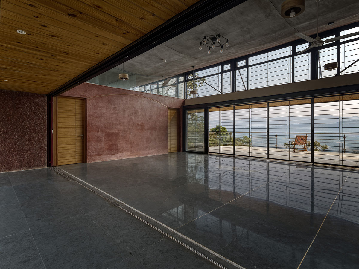 The Cove House by Red Brick Studio benefits from hilly slope and captures picturesque views in India