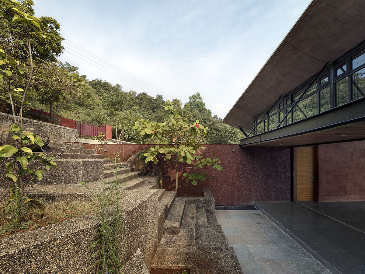 The Cove House by Red Brick Studio benefits from hilly slope and captures picturesque views in India