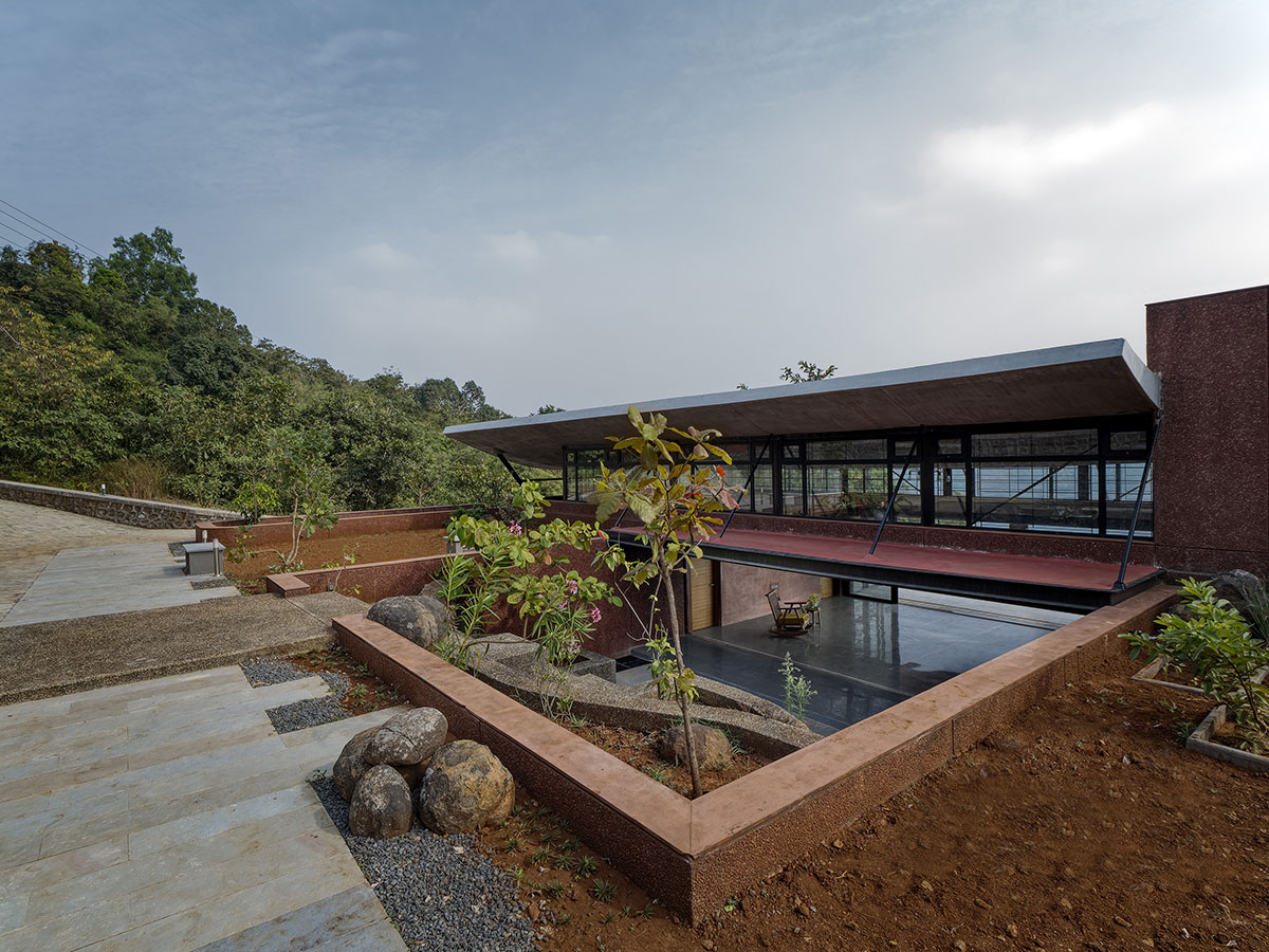 The Cove House by Red Brick Studio benefits from hilly slope and captures picturesque views in India