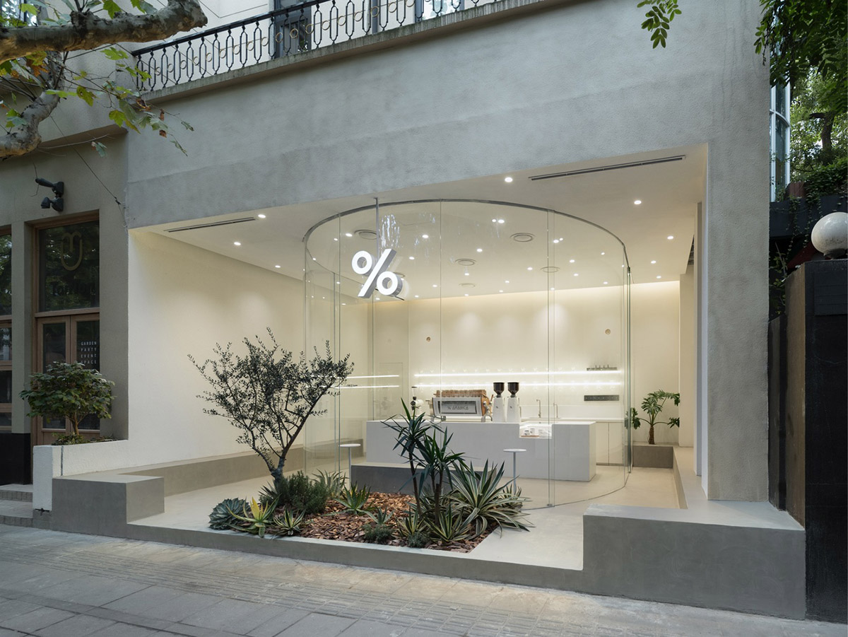 B.l.U.E. Architecture Studio designs this minimal coffee shop with glass frontage in Shanghai