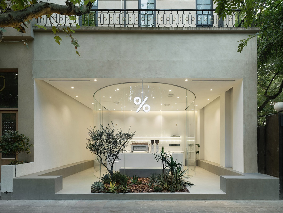 B.l.U.E. Architecture Studio designs this minimal coffee shop with glass frontage in Shanghai