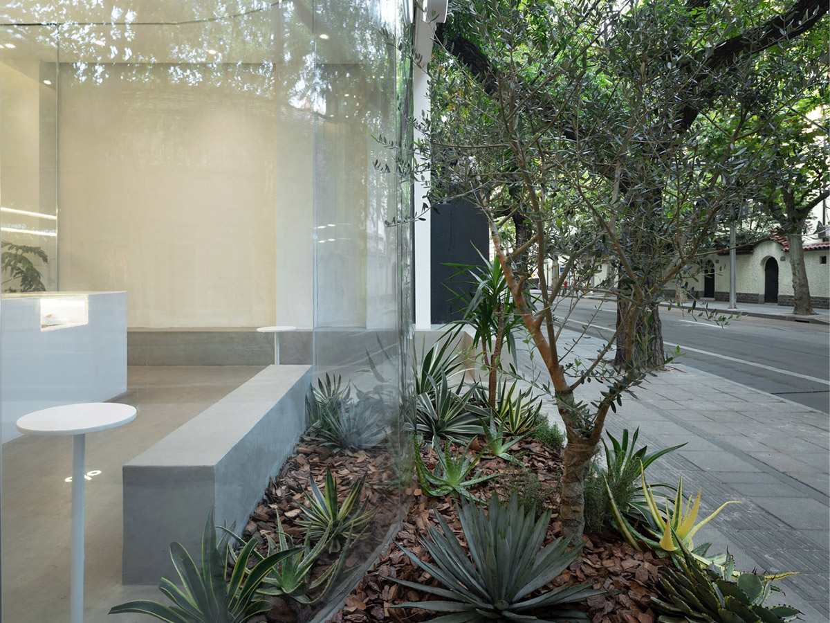 B.l.U.E. Architecture Studio designs this minimal coffee shop with glass frontage in Shanghai