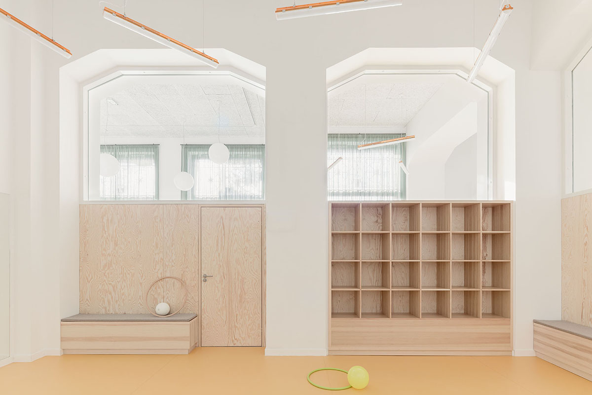 Archikon Architects revives community center with powder-colored and light elements in Budapest