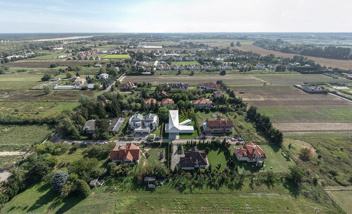 Movements of sun define the form of this protruding house designed by KWK Promes in Poland