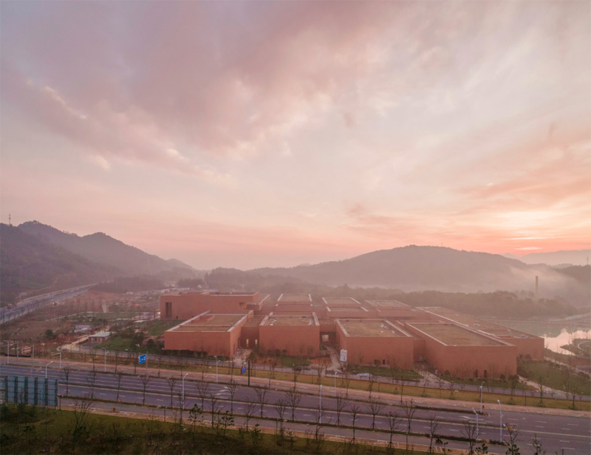 David Chipperfield completes Zhejiang Museum of Natural History with red ochre paint in Anji