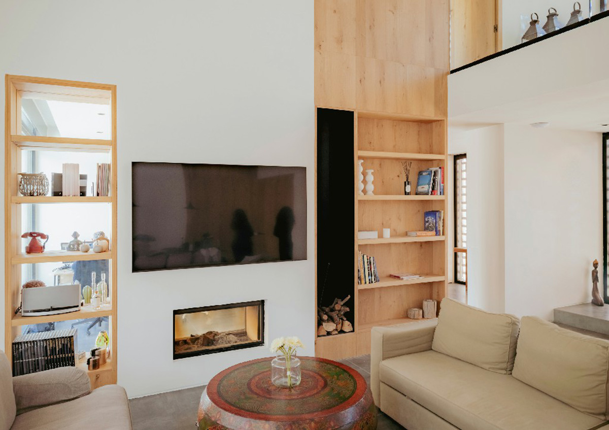 Casa Umbral features a brick-lattice façade that scatters soft light into the interior in Madrid