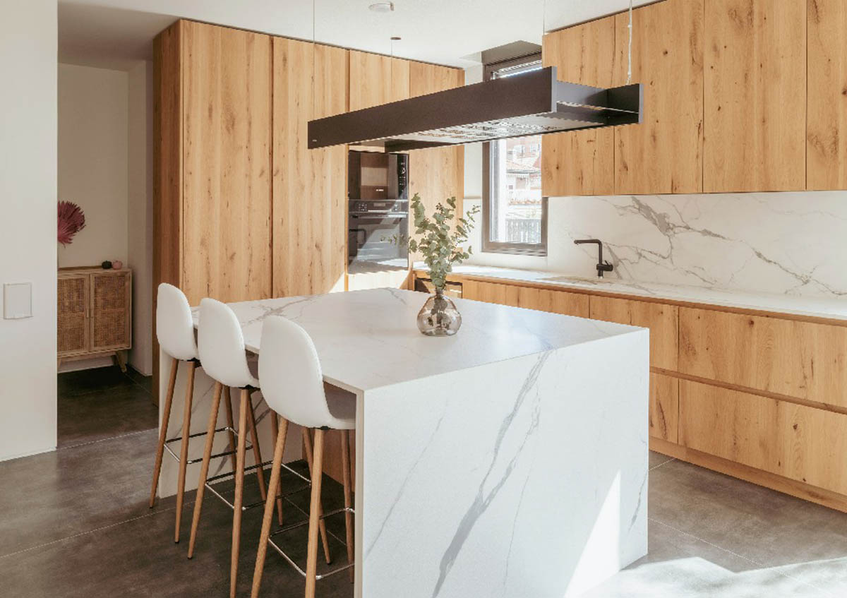Casa Umbral features a brick-lattice façade that scatters soft light into the interior in Madrid