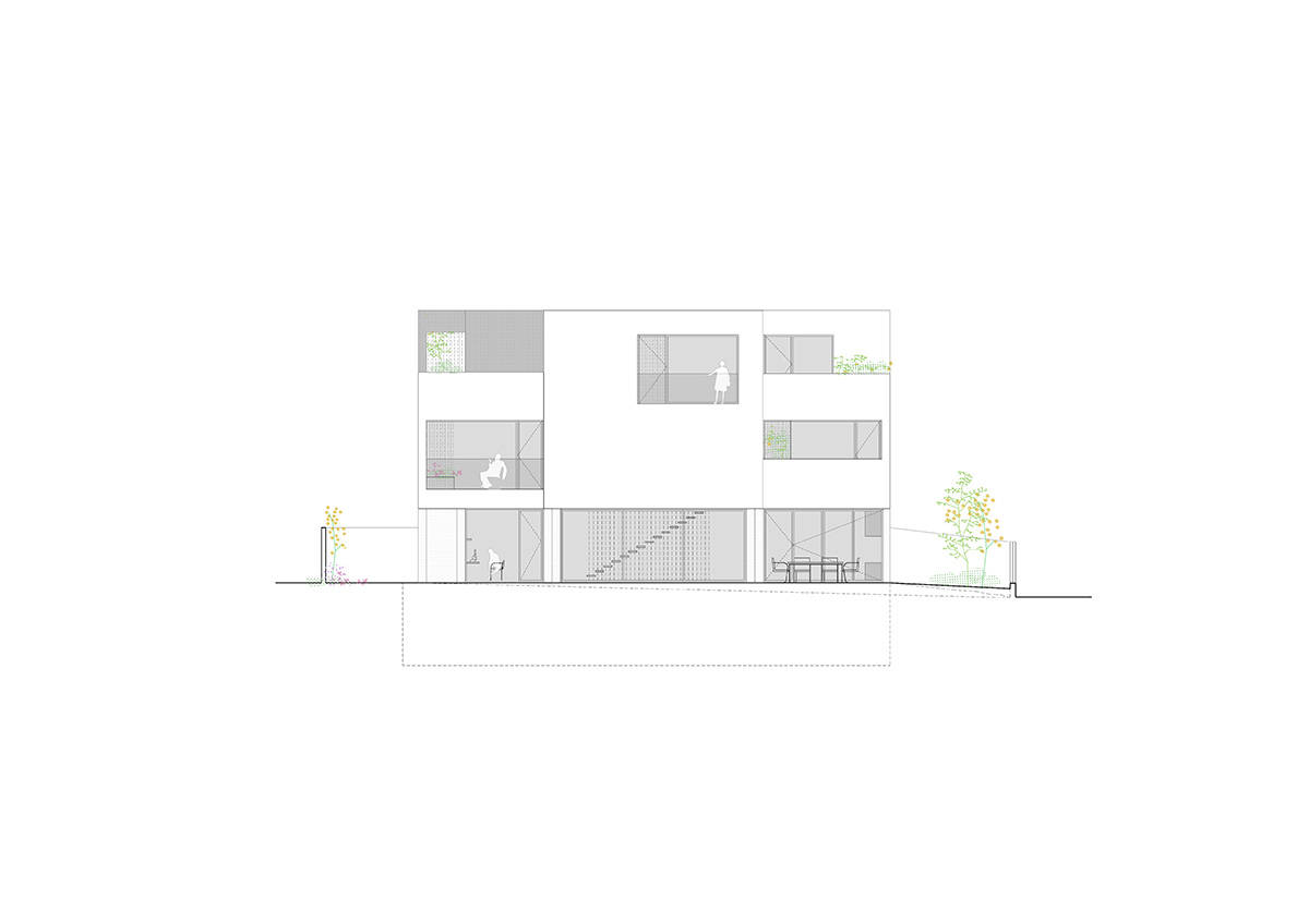 Casa Umbral features a brick-lattice façade that scatters soft light into the interior in Madrid