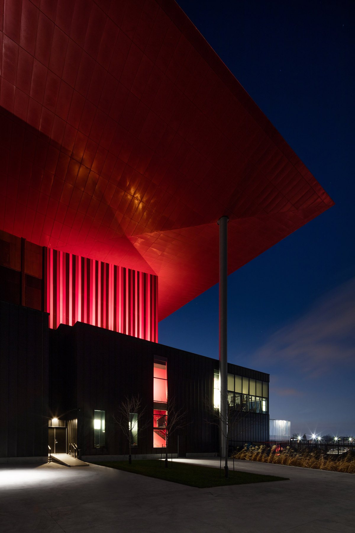 Paul Laurendeau completes outdoor summer amphitheater in Quebec with bold red floating roof